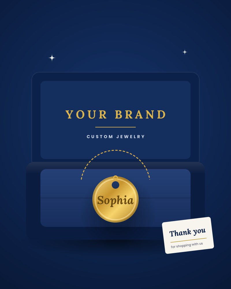 An open navy jewelry box printed with your brand, holding a gold pendant, with a thank-you card
